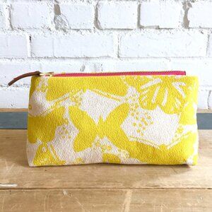 Erin Flett yellow butterfilies make up bag